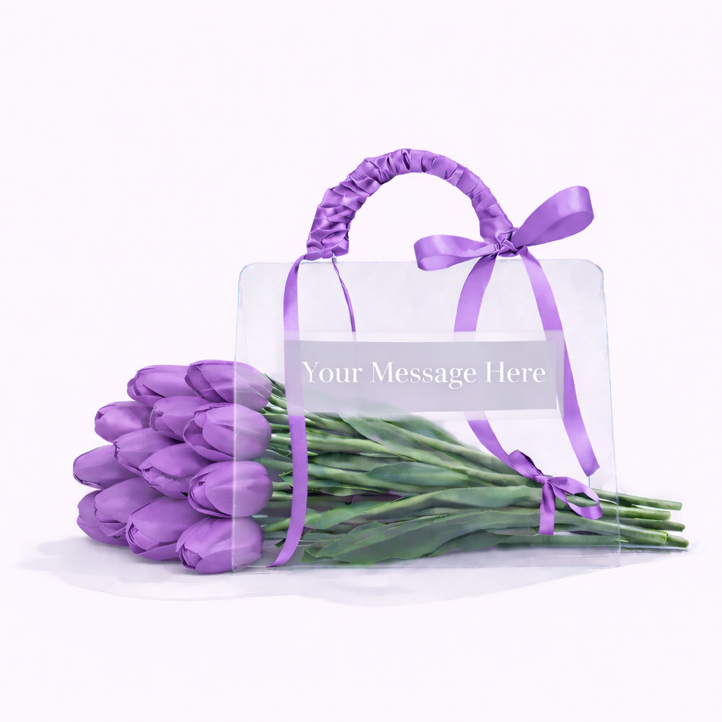 Bouquet of purple tulips with a clear bag and ribbon on a white background