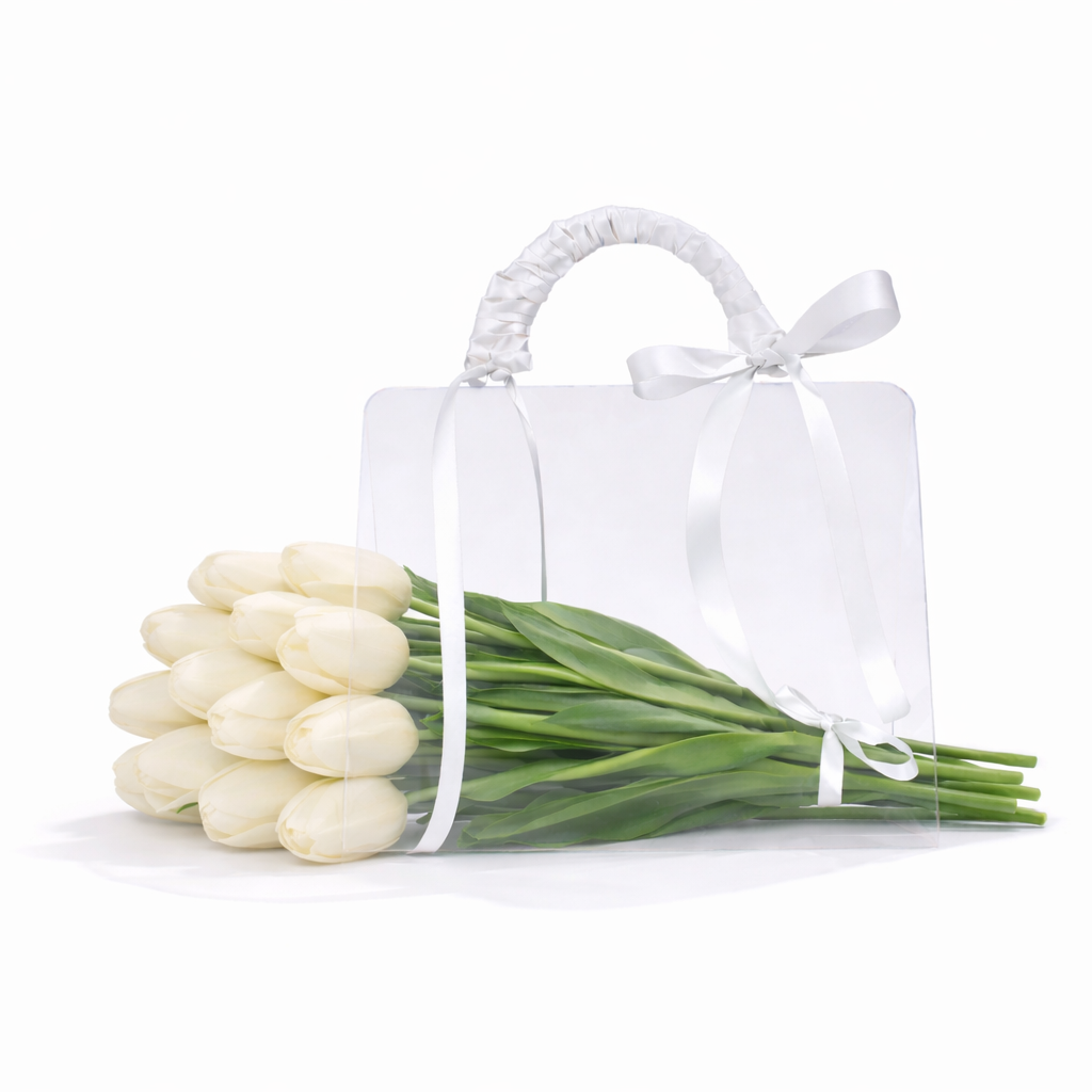 Bouquet of white tulips in a clear plastic bag on a white background