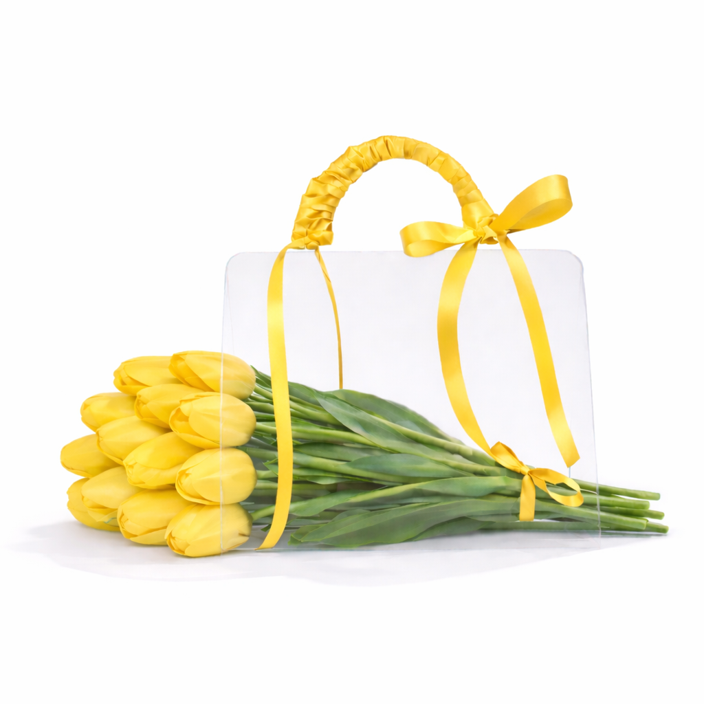 Bouquet of yellow tulips tied with a yellow ribbon on a white background
