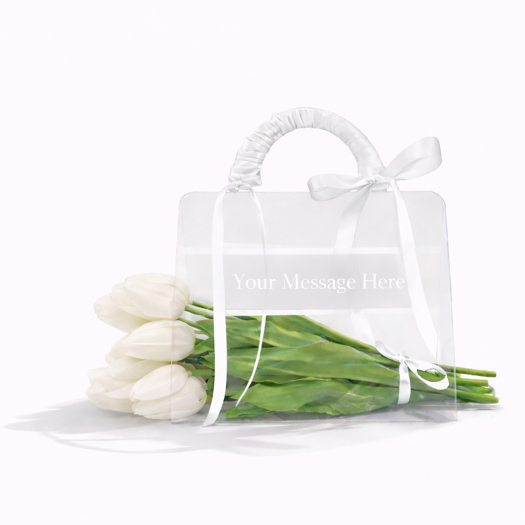 Clear plastic bag with white tulips on a white background